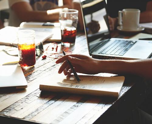 Students studying at coffee shop