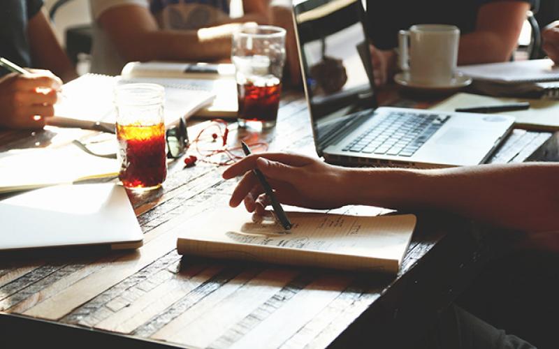 Students studying at coffee shop